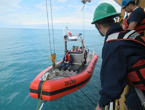 Boat deck personnel launch the Mk-IV Over-the-Horizon cutter boat. Boat deck personnel launch the Mk-IV Over-the-Horizon cutter boat.